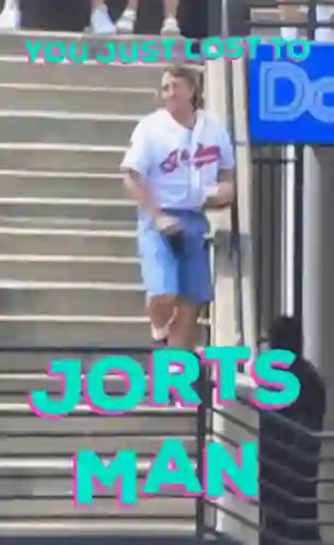 JORTS IWTH INDECIPHERABLE WRITING ON THE CROTCH - WHY GOD WHY MUST YOU ALLOW SUCH SIN!?